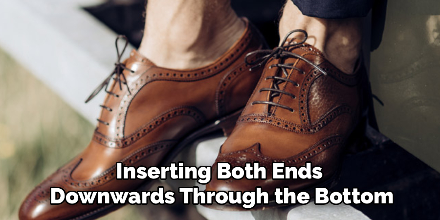 Inserting Both Ends 
Downwards Through the Bottom