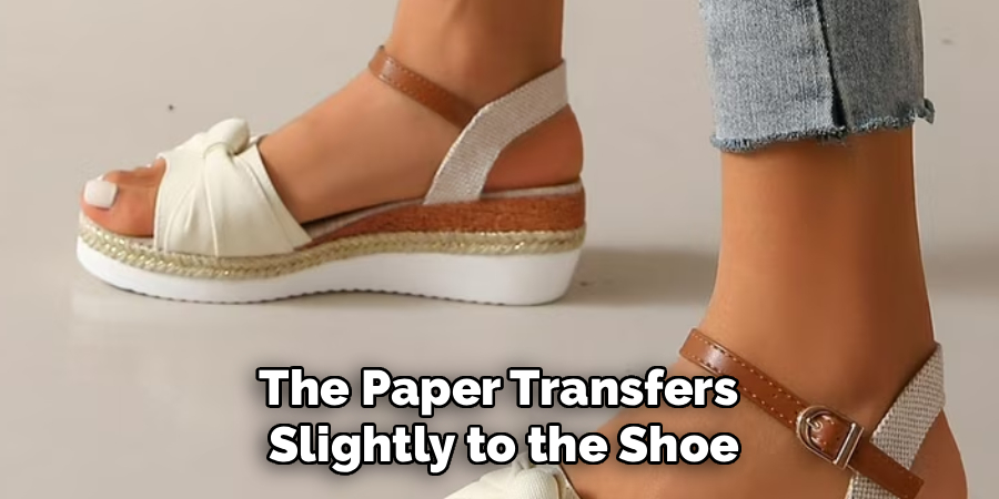 The Paper Transfers
Slightly to the Shoe