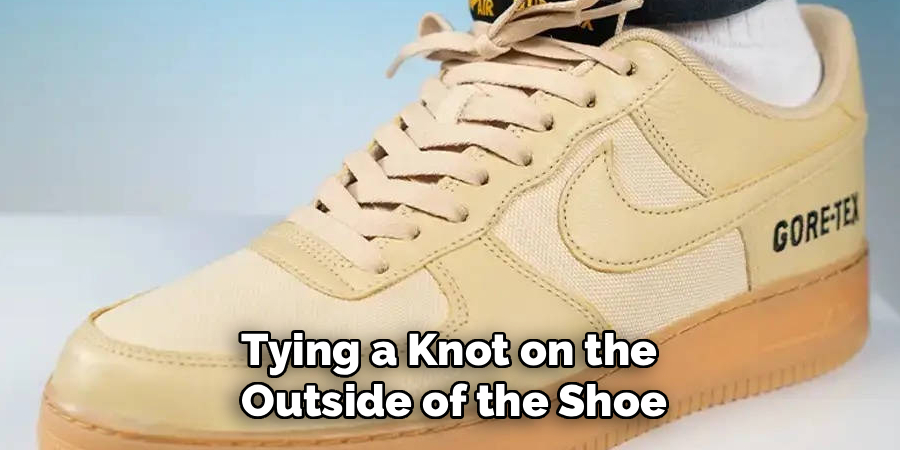 Tying a Knot on the 
Outside of the Shoe