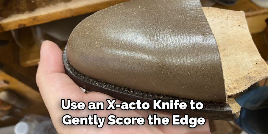 Use an X-acto Knife to
 Gently Score the Edge